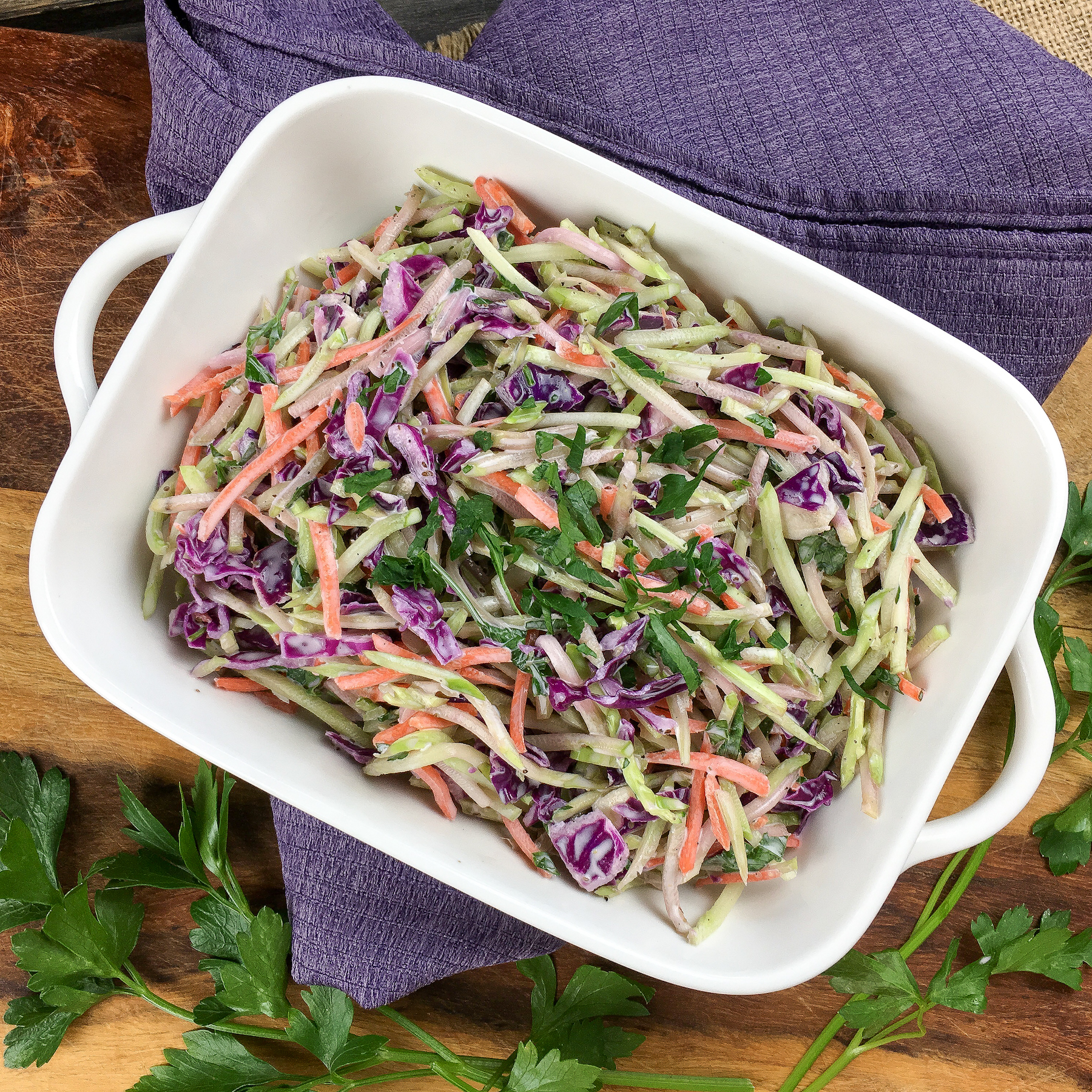 broccoli slaw in white serving dish